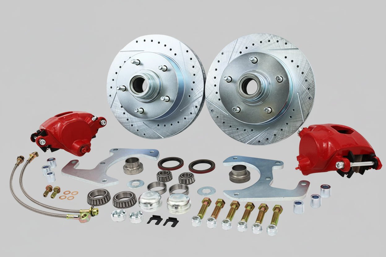 Car brake system components including rotors, calipers, and hardware on a white background
